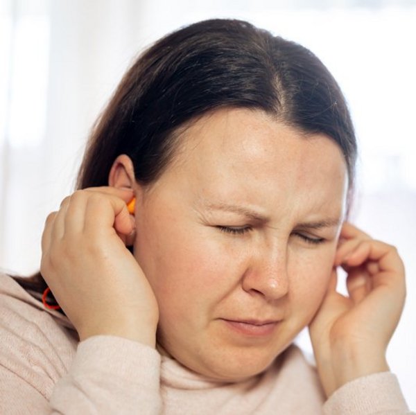 young-woman-suffering-from-tinnitus-disease-civilization-healthcare-concept.jpg